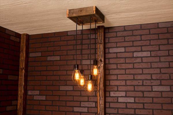 recycled pallet caged light chandelier