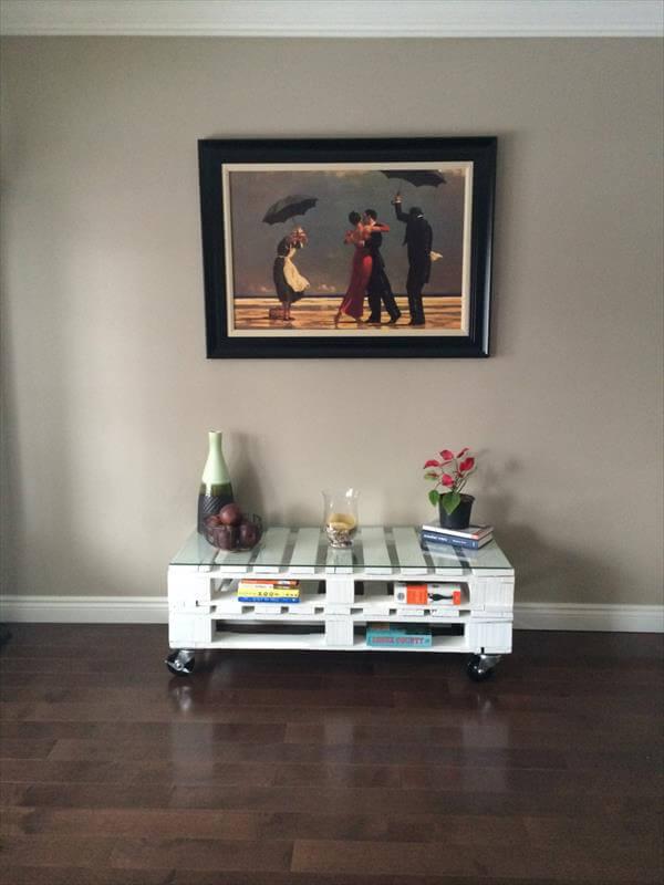 repurposed shabby chic white coffee table with wheels and glass top