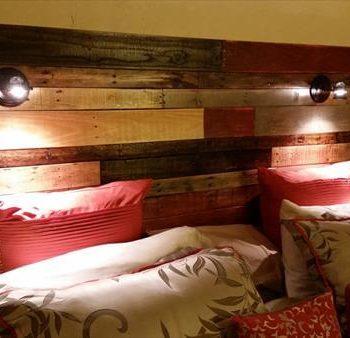 recycled pallet colorful headboard with lights