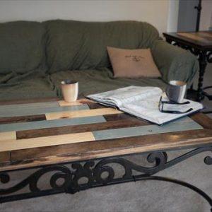 repurposed pallet coffee table with industrial metal base