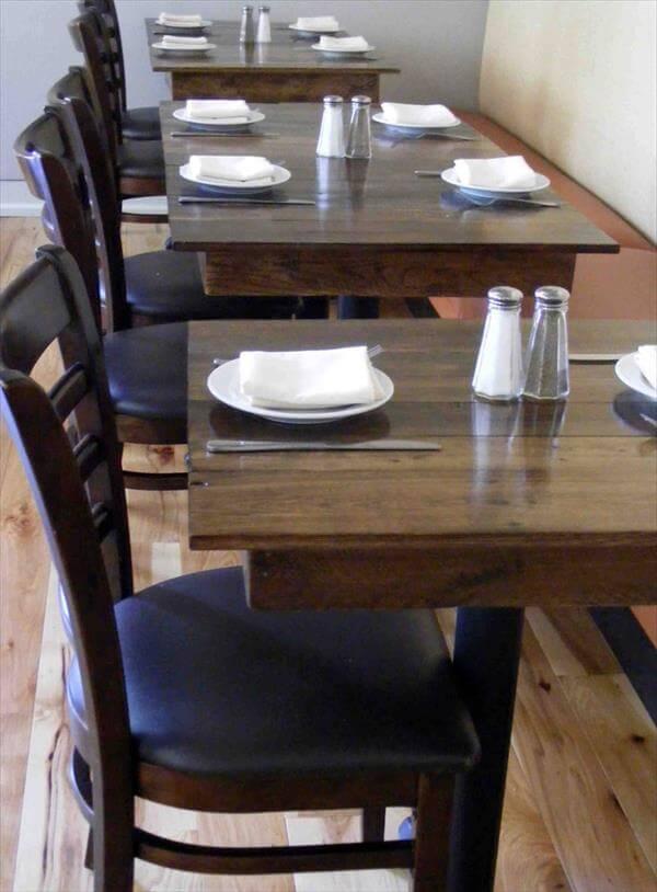 recycled pallet and single metal leg tables