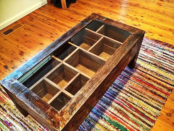 reclaimed pallet coffee table with glass top and segregated interior storage