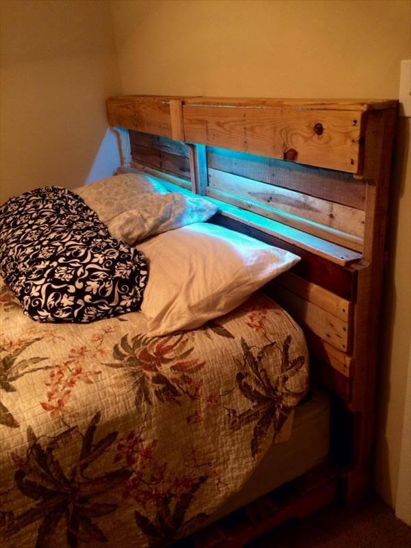 recycled pallet bed and headboard with blue LEDs