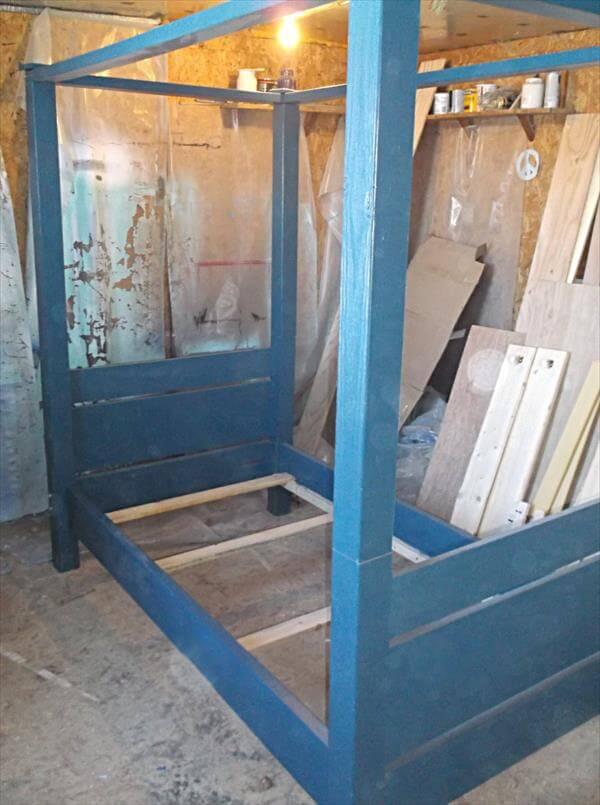 handcrafted pallet blue painted canopy bed