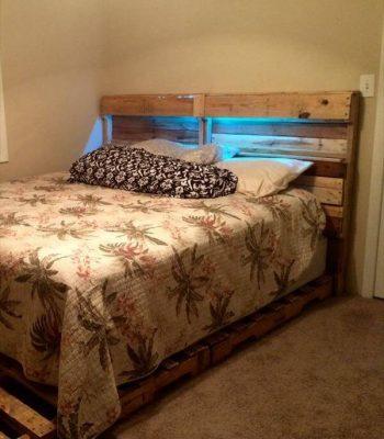 upcycled wooden pallet bed and headboard with lights