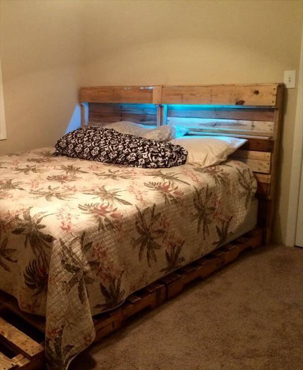 upcycled wooden pallet bed and headboard with lights