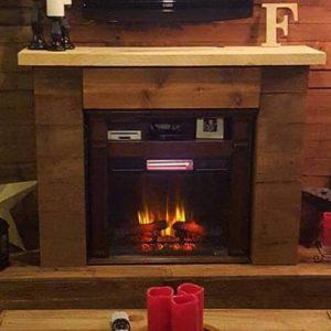 diy pallet wall with faux fire place