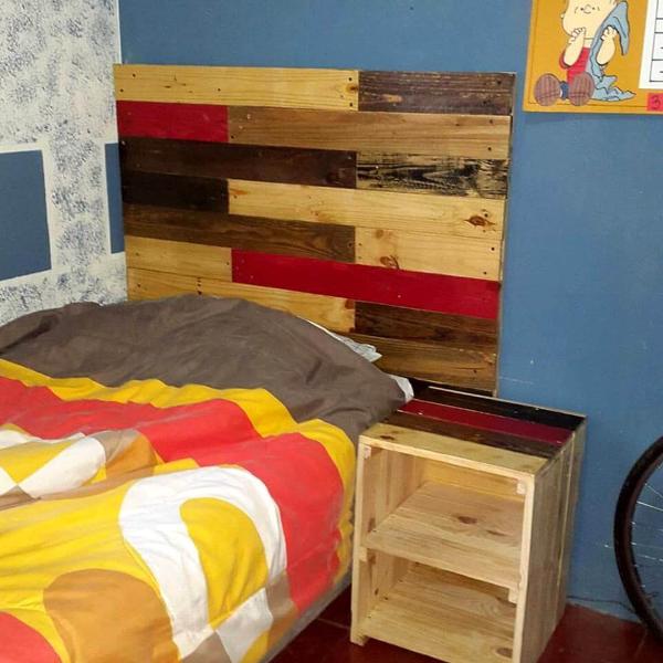 Pallet made headboard with side table