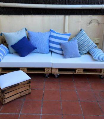 repurposed wooden pallet sofa with matching ottoman