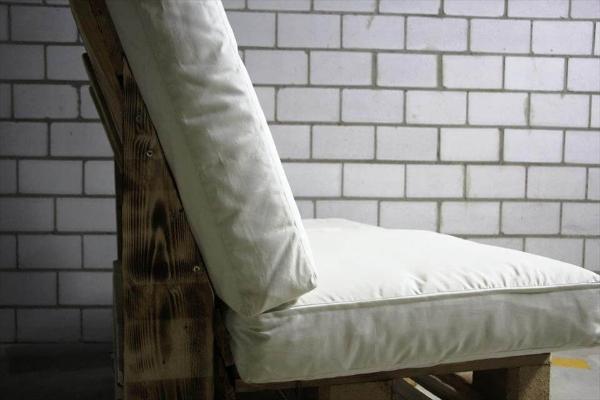 upcycled wooden pallet patio bench with white cushion