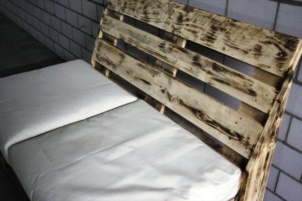 rustic wooden pallet cushioned bench