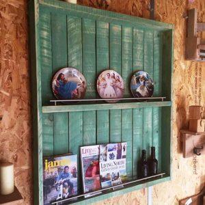distressed green pallet wall unit