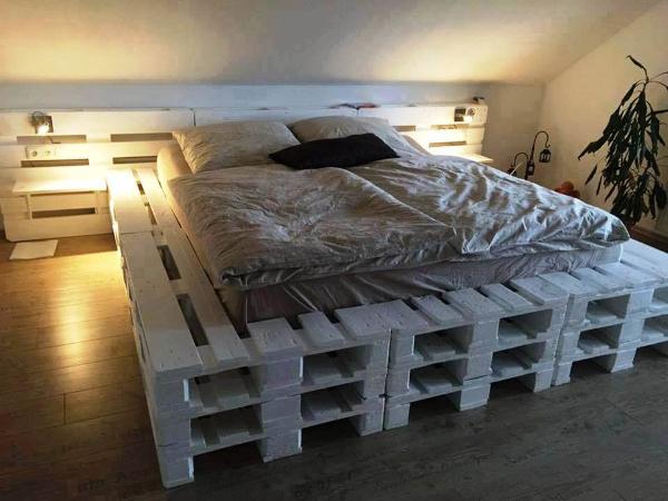 white painted stacked pallet bed