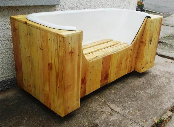 self-made pallet and old bathtub bench