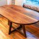 enhancing your space with oval dining tables